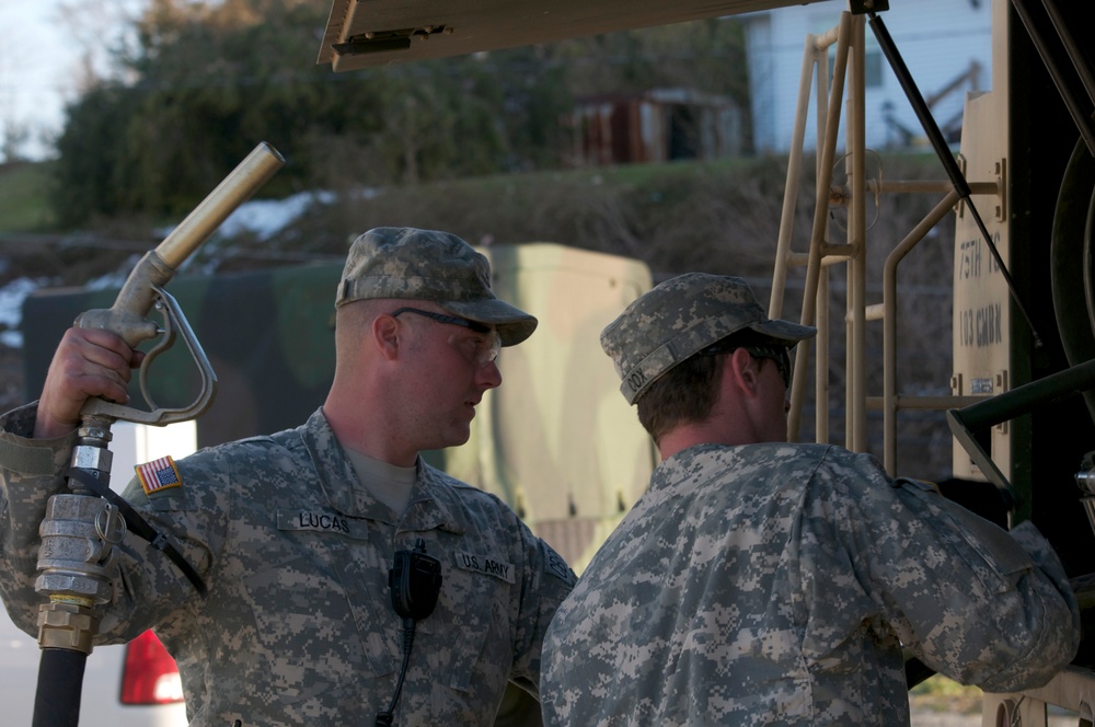 Guardsmen keep relief efforts going one gallon at a time