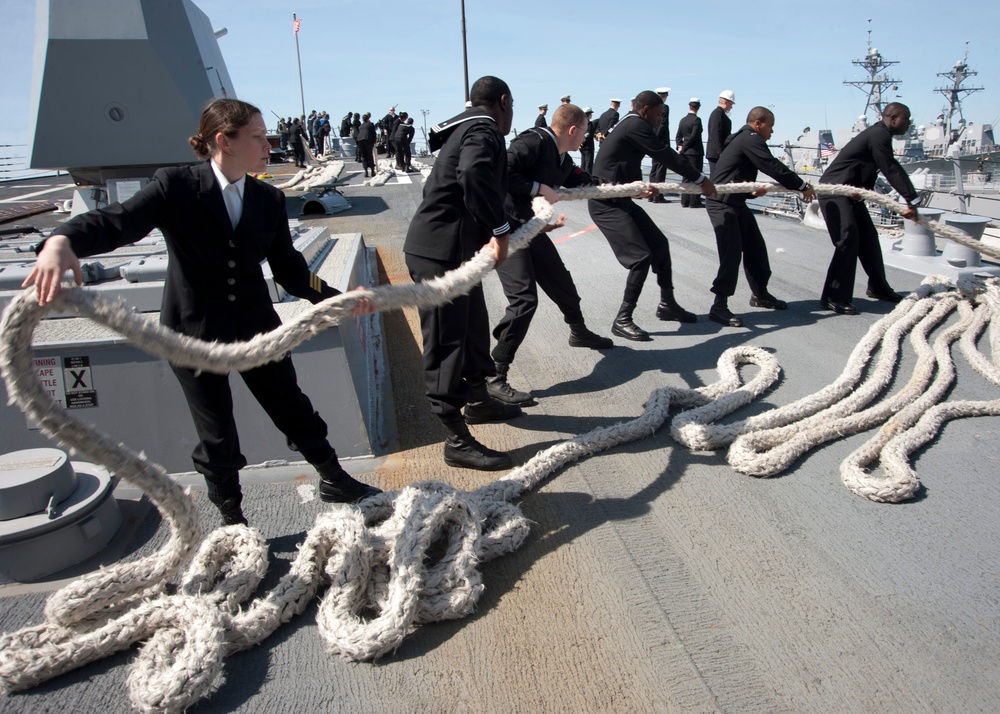 USS James E. Williams sailors heave a line