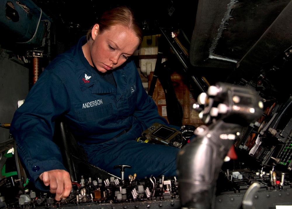 USS James E. Williams sailors performs maintenance