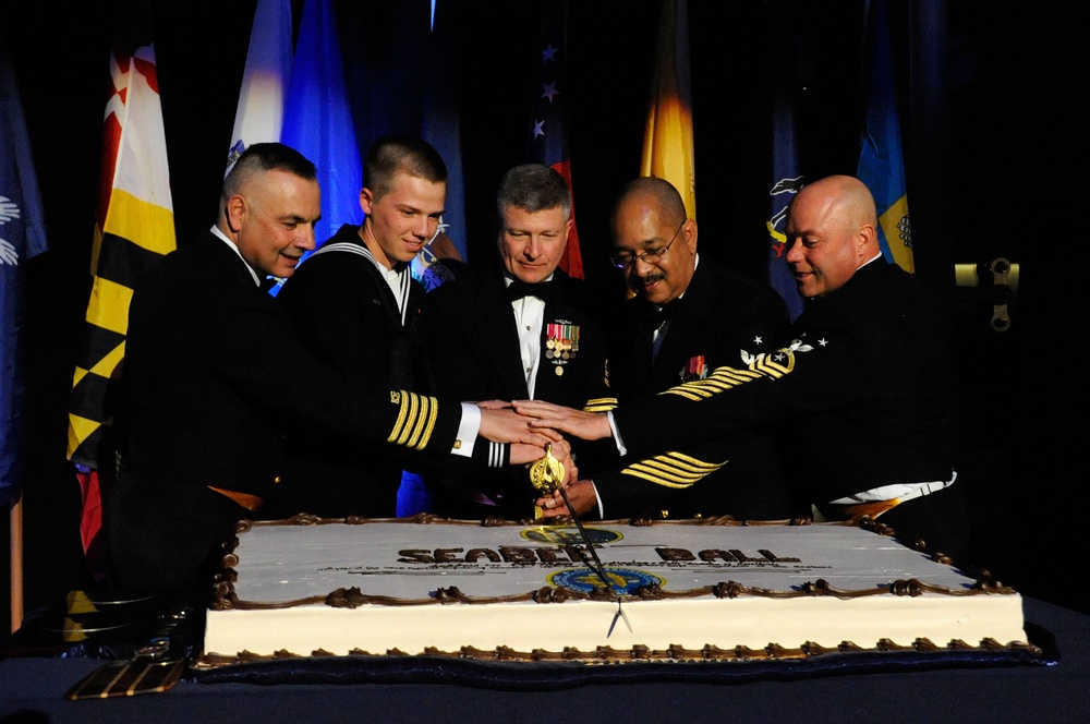 Cutting the Seabee Ball birthday cake