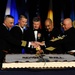 Cutting the Seabee Ball birthday cake