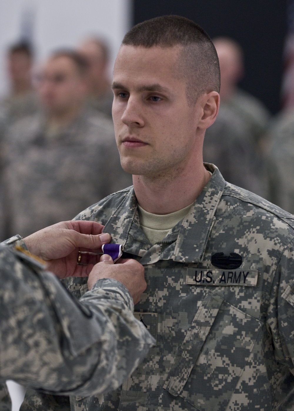 Soldier recieves Purple Heart at welcome home ceremony