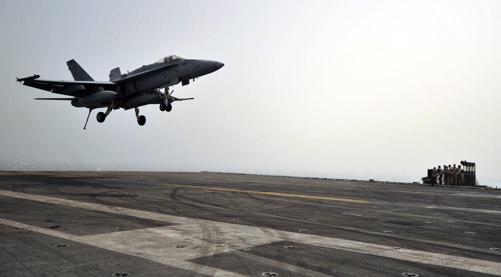 F/A-18F Super Hornet prepares to land aboard USS Abraham Lincoln