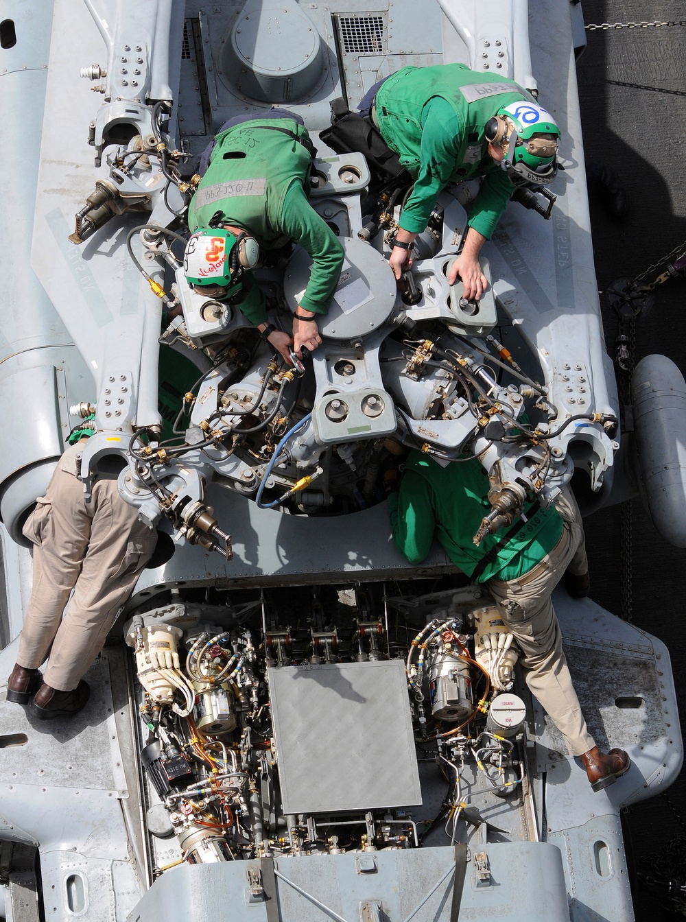 USS Abraham Lincoln sailors perform maintenance