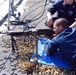 USS Nitze sailor fires during exercise