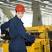 USS George H.W. Bush sailor operates forklift