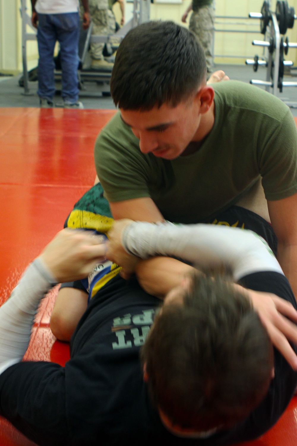 Marines, civilians connect through armbars and choke holds