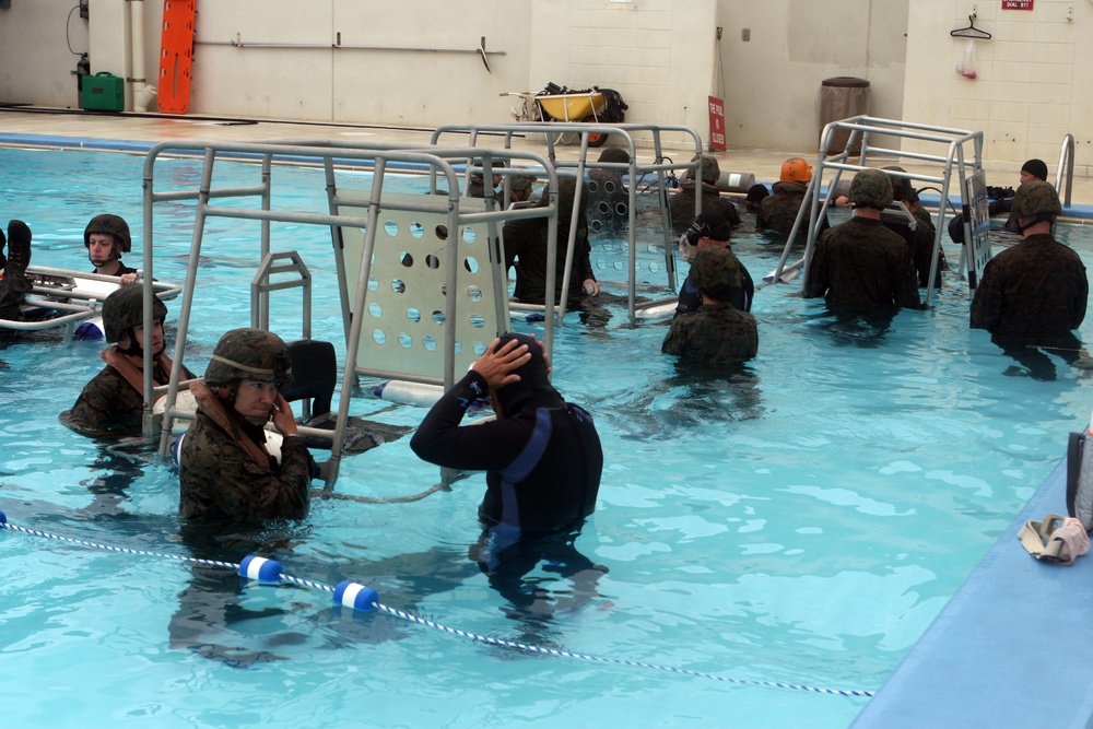 Marines practice using underwater breathing device