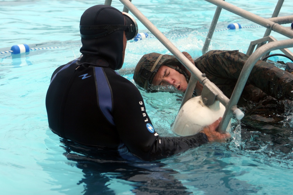 Marines practice using underwater breathing device