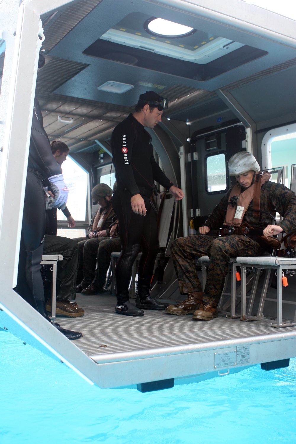 Marines practice using underwater breathing device