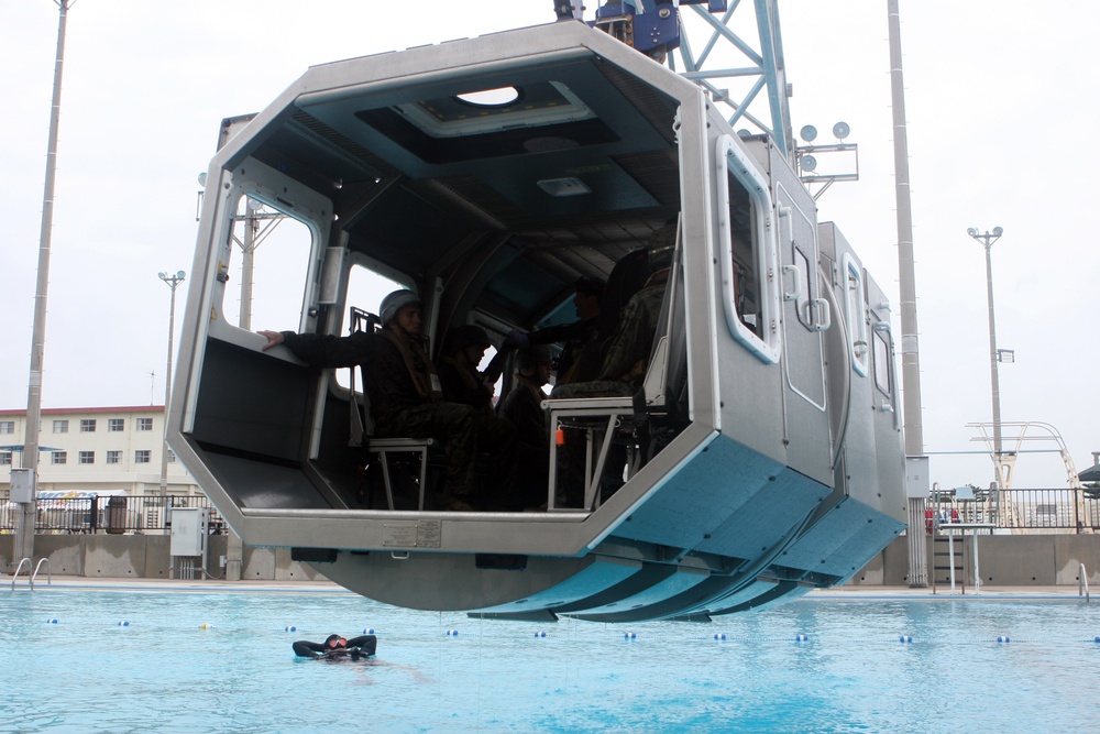 Marines practice using underwater breathing device