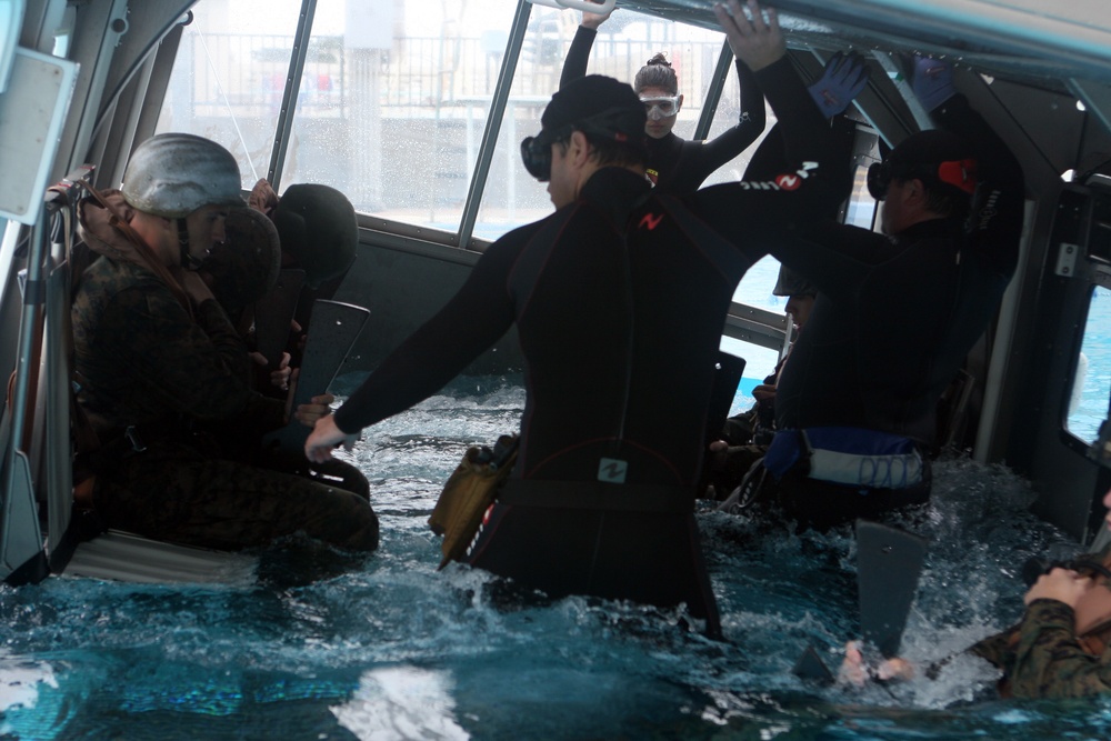 Marines practice using underwater breathing device