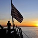 USS Forrest Sherman sailor raises flag
