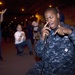USS Dwight D. Eisenhower sailor sings during karaoke night