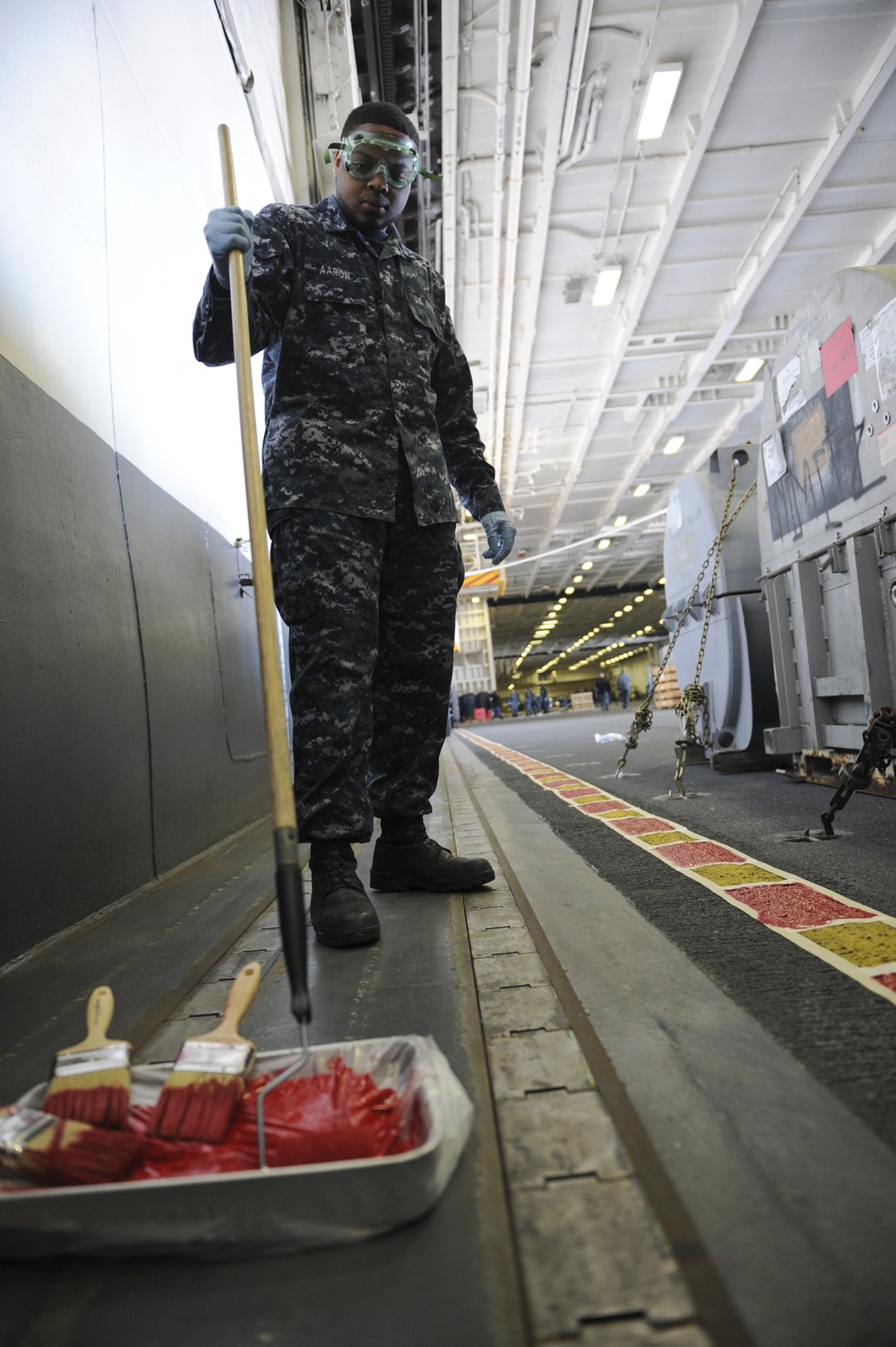 USS Nimitz touches-up the hangar bay