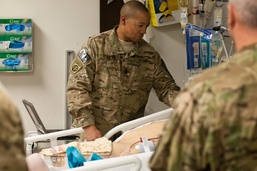CSM Capel with soldier in hospital