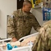 CSM Capel with soldier in hospital