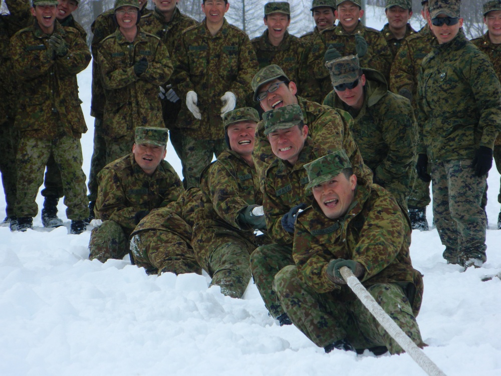 JGSDF, Marines compete in a tug-of-war competition during Forest Light