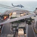 Departing the flight deck of USS Pearl Harbor