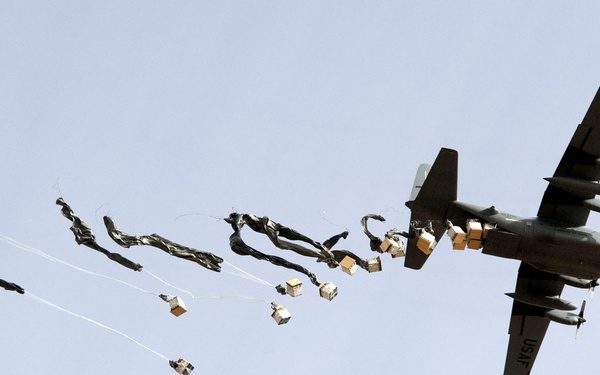 Coalition forces receive supplies via CDS drop