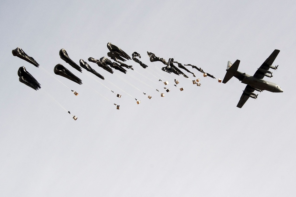 Coalition forces receive supplies via CDS drop