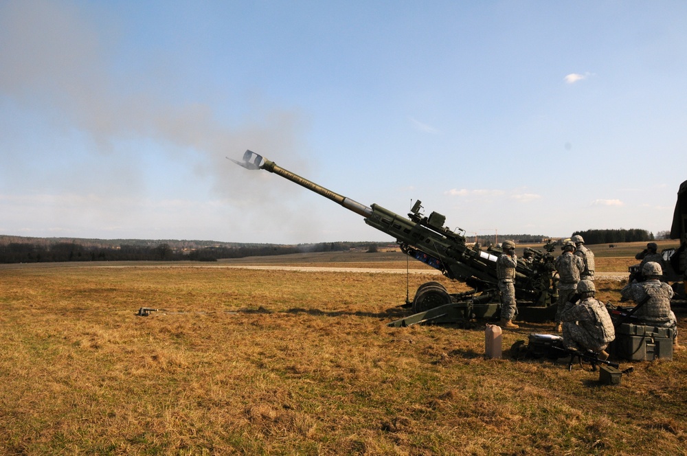 Soldiers from A Company, 1st Platoon, Fires Squadron, 2nd Cavalry Regiment, fire M777 Howitzer
