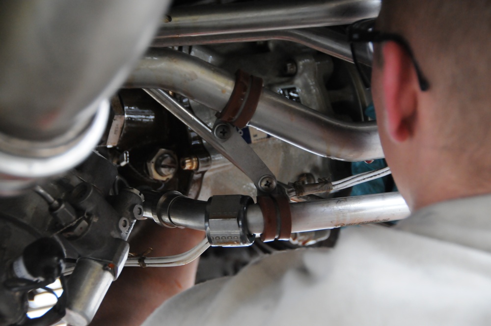 Hydraulic pump removal over the shoulder