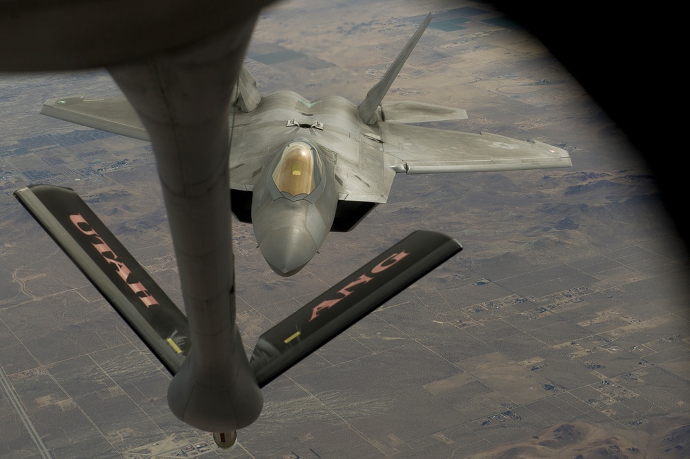 Utah Air National Guard refueling F-22 Raptor and F-16
