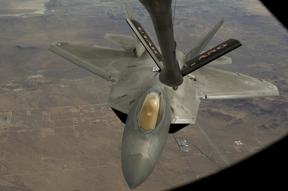 Utah Air National Guard refueling F-22 Raptor and F-16