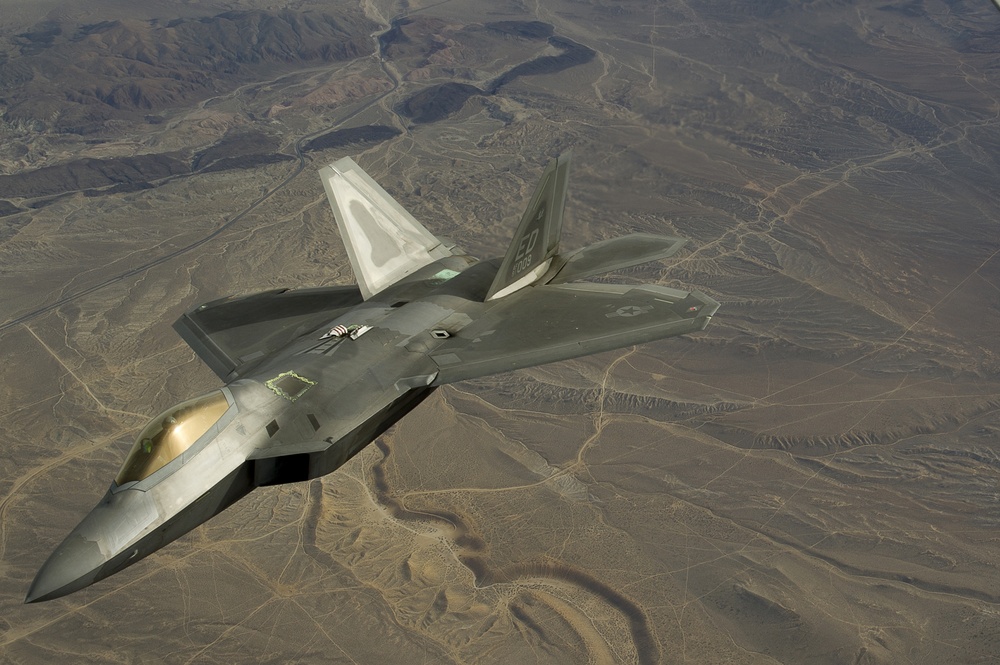 Utah Air National Guard refueling F-22 Raptor and F-16