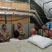 Vice Adm. William French tours a containerized living unit