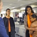 First Lady Michelle Obama and her daughters, Sasha and Malia, tour the Coast Guard Cutter Stratton