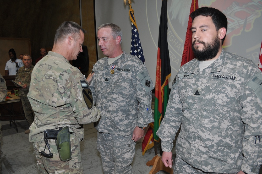 Two USACE civilians receive the Defense of Freedom Medal in Afghanistan