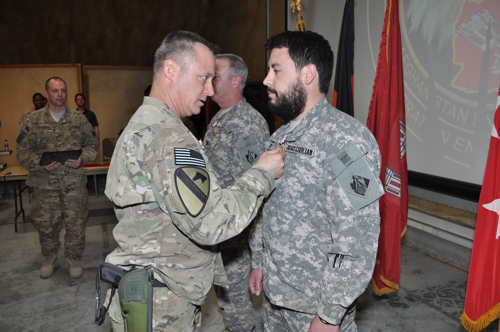 Two USACE civilians receive the Defense of Freedom Medal in Afghanistan