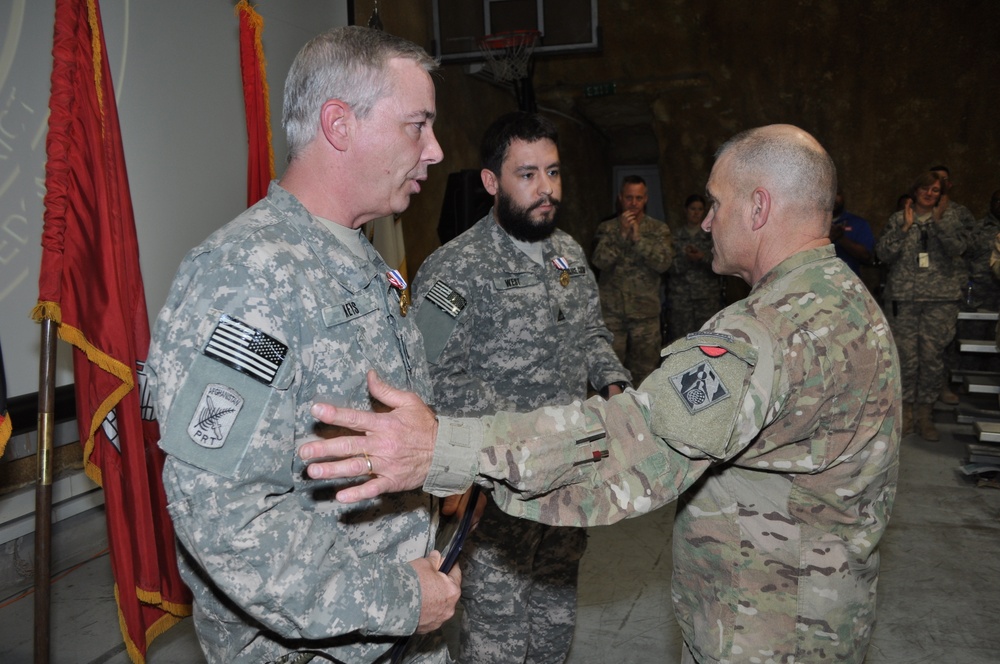 Two USACE civilians receive the Defense of Freedom Medal in Afghanistan