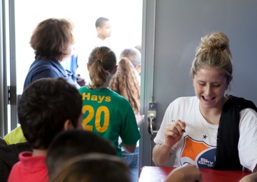 Professional soccer players speak to students about soccer, life