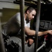 USS Carl Vinson sailor cleans engine