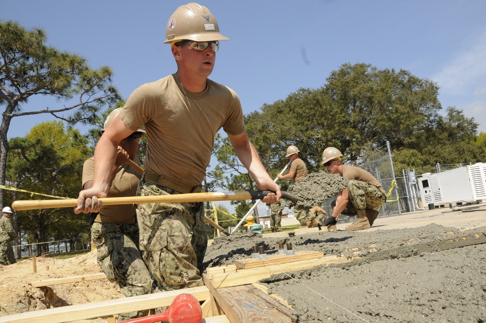 NMCB 133 Seabee leads crew