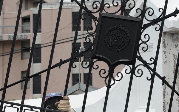 MDSU 2 sailors replace cemetery gate