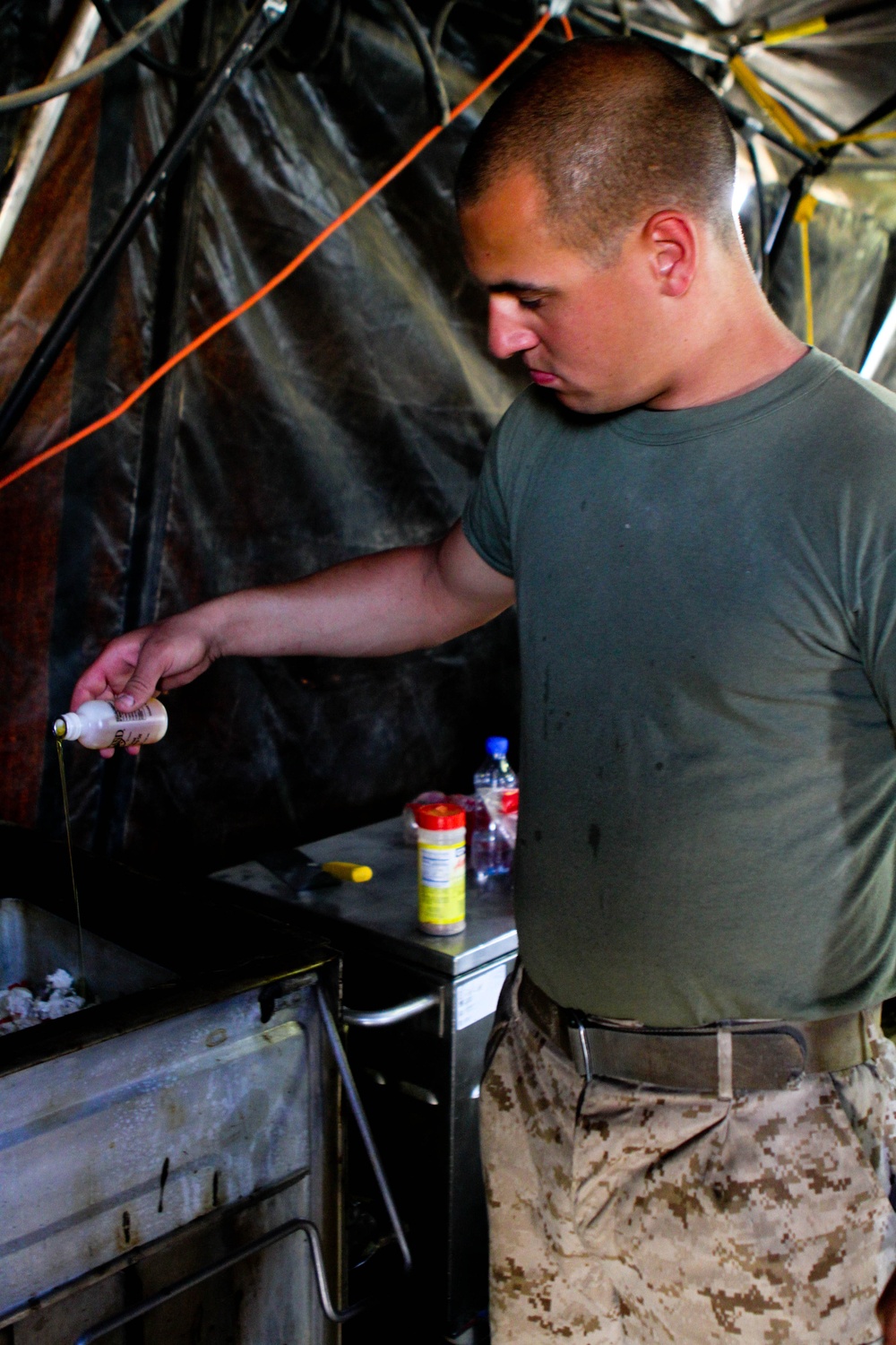 Two Marines feed a battalion, fuel the mission