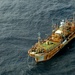 Coast Guard overflight reconfirms position of unmanned Japanese vessel