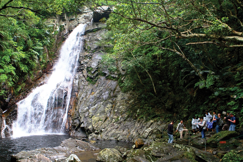 Hikers splash their way to Hiji Falls