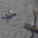 Coast Guard Cutter Anacapa sinks adrift Japanese fishing vessel.