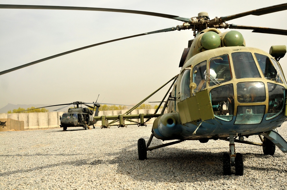 Afghan forces work together during air assault operations