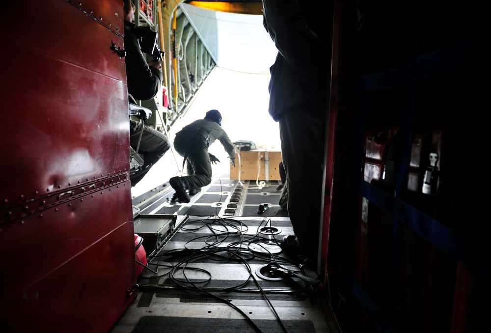 International Ice Patrol deploys a World Ocean Circulation Experiment buoy over the North Atlantic