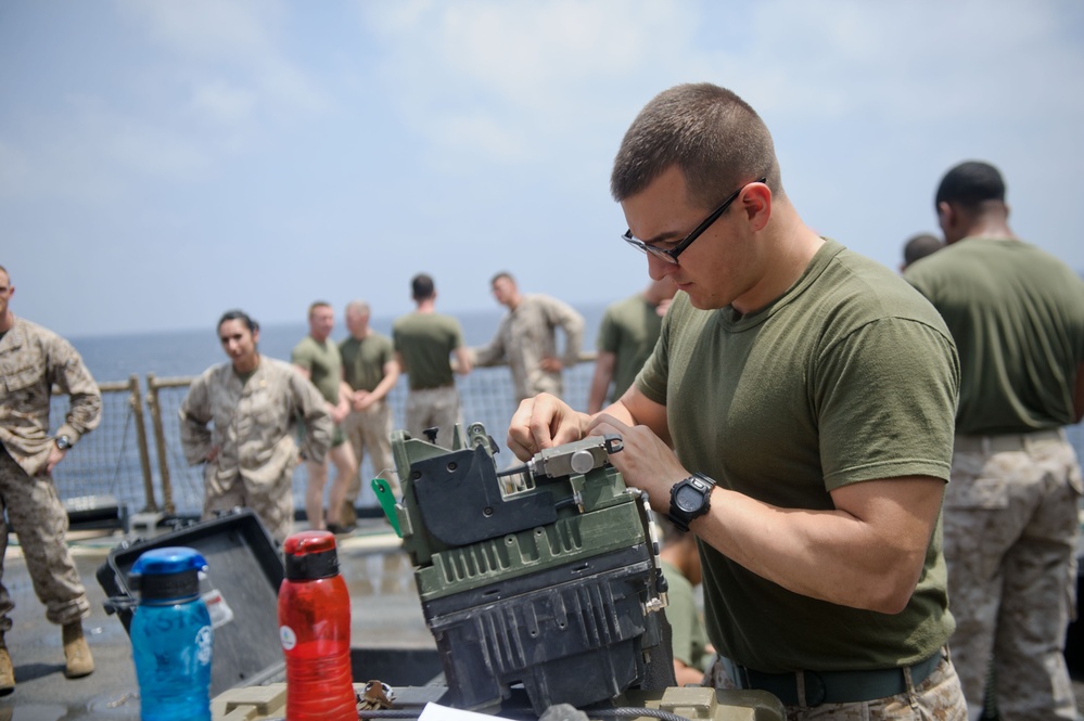 Marines wash up aboard USS Pearl Harbor