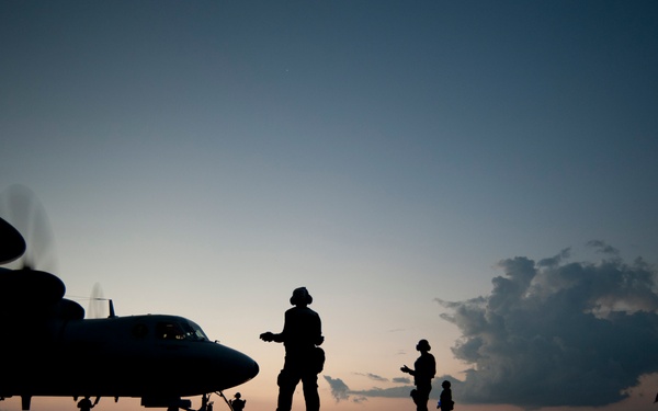 Preparing an E-2C Hawkeye for launch