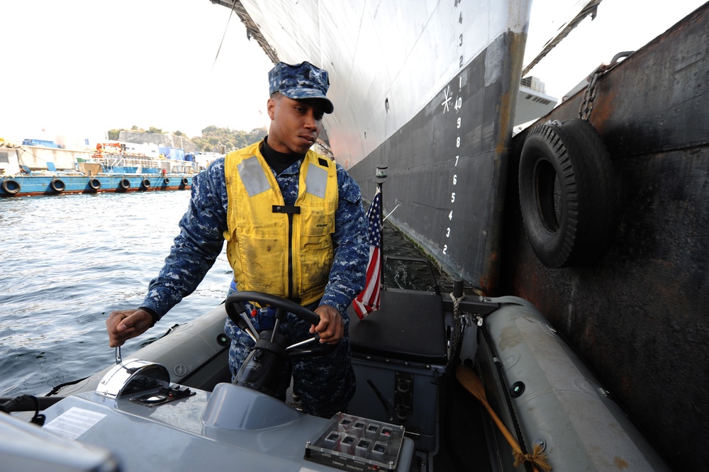 USS George Washington sailor pilots rigid hull inflatable boat