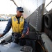 USS George Washington sailor pilots rigid hull inflatable boat