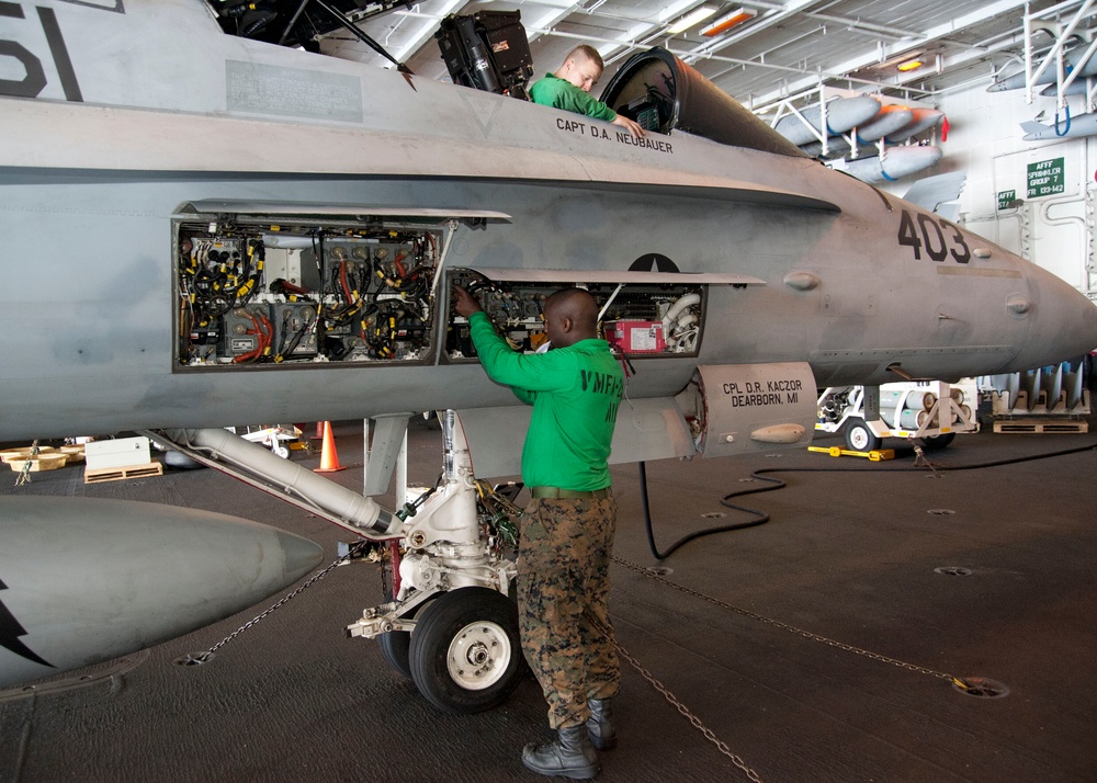 USS Enterprise sailor check electrical systems